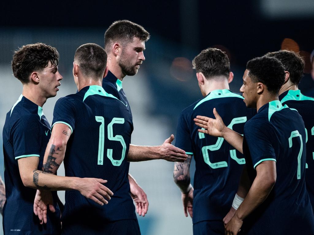 The Socceroos celebrate after taking the lead against Bahrain from an own goal. Picture: Martin Dokoupil/Getty Images