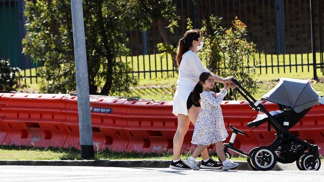 Residents out and about near the Queensland-NSW border in Coolangatta.