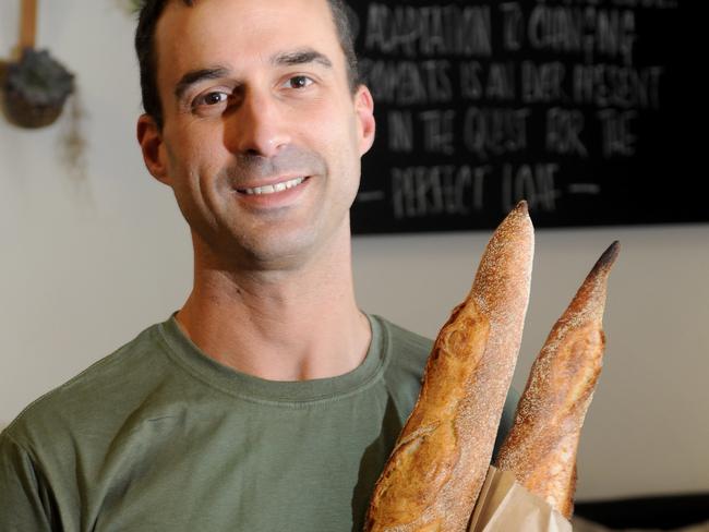 East Street: Barkly St, St Kilda. Woodfrog Bakery at 108 Barkly St. Baker Jarrod Hack with some of his loaves. Picture: Andrew Henshaw