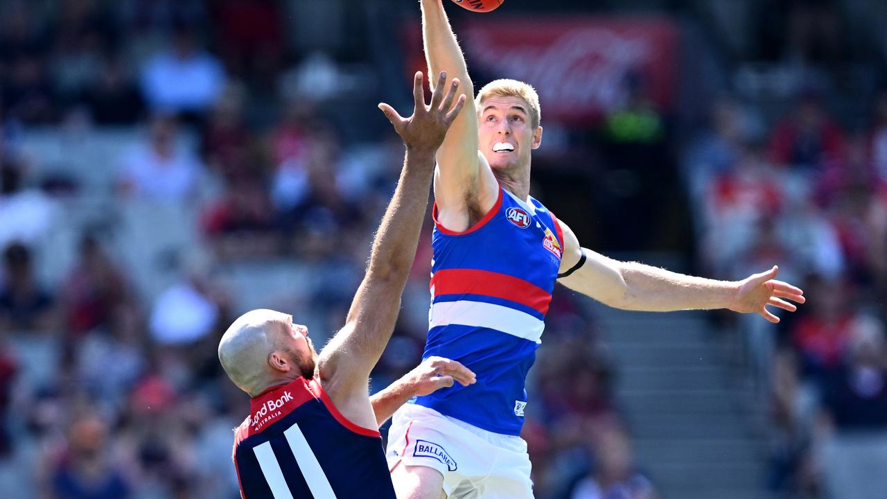 Tim English and Max Gawn fly for a centre bounce. Picture: Quinn Rooney/Getty Images