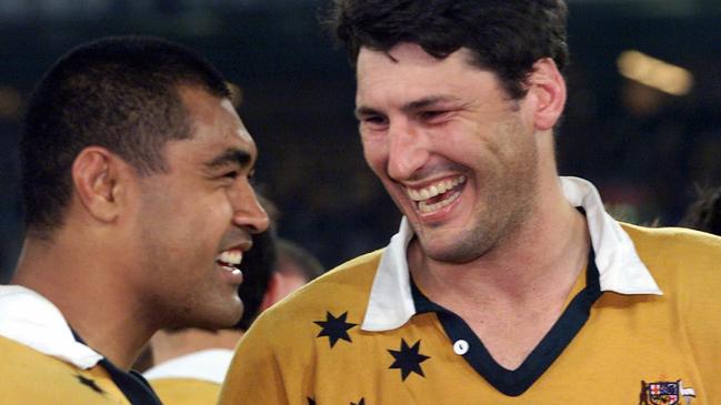 Wallaby captain John Eales with Toutai Kefu.