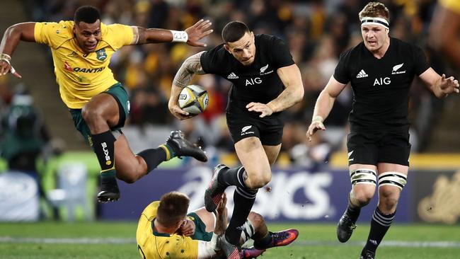 Sonny Bill Williams of the All Blacks makes a break against the Wallabies.