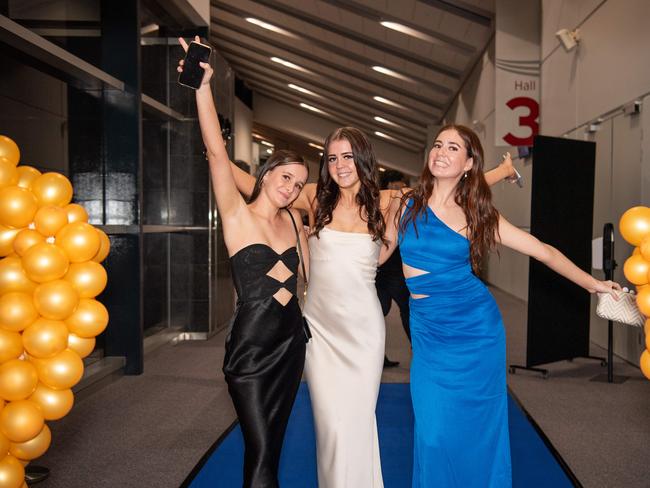 Sophie Collins, Sophie Hawkes and Seve Moir at the Year 12 School formals of Darwin High School at Darwin Convention Centre, Darwin. Picture: Pema Tamang Pakhrin.