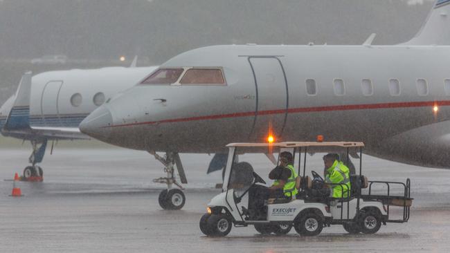 SYDNEY, AUSTRALIA - NewsWire Photos FEBRUARY 19, 2024: Taylor SwiftÃs jet arrives at Sydney airport today in heavy rain. The jet pulled in to the hangar so that she could exit the plane and head to her hotel unseen. Picture: NCA NewsWire / David Swift