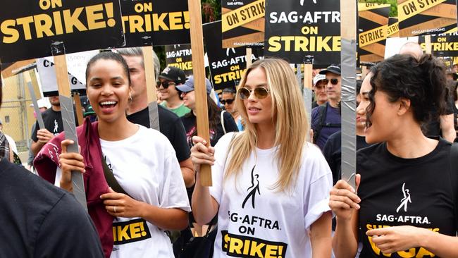 Margot Robbie marches from Netflix Studios to Paramount Studios during a SAG-AFTRA rally in West Hollywood. Picture: Giles Harrison / London Entertainment