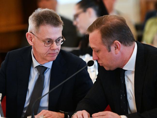 BRISBANE, AUSTRALIA - NewsWire Photos - JULY 23, 2024. Queensland Premier Steven Miles (right) talks to his Director General Mike Kaiser during an Estimates Committee hearing at Parliament House.Picture: Dan Peled / NewsWire