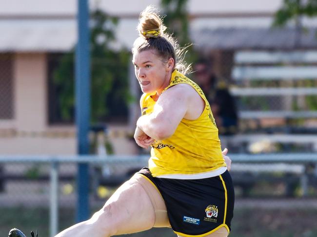 Nightcliff captain Hannah Turnbull boots the ball forward in the 2023-24 NTFL season. Picture: Celina Whan / AFLNT Media