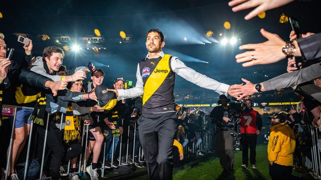 Marlion Pickett celebrates with Richmond fans during the post-match AFL Grand Final celebrations at the MCG. Picture: Mackenzie Sweetnam/Getty