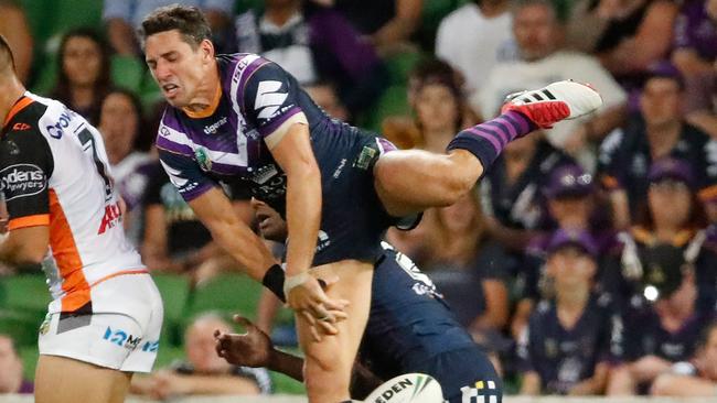 Billy Slater drops a high ball as he collides with Suliasi Vunivalu.