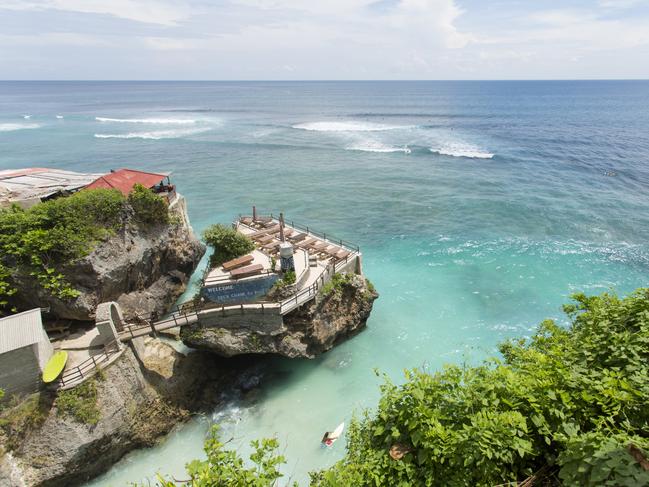 A restaurant overlooking the paddle out cave and breakers at Uluwatu, Bali Picture: Istock