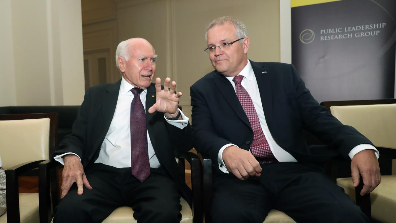 Former prime minister John Howard and his contemporary successor Scott Morrison share similar experiences in an internal battle over climate change. Picture: Gary Ramage