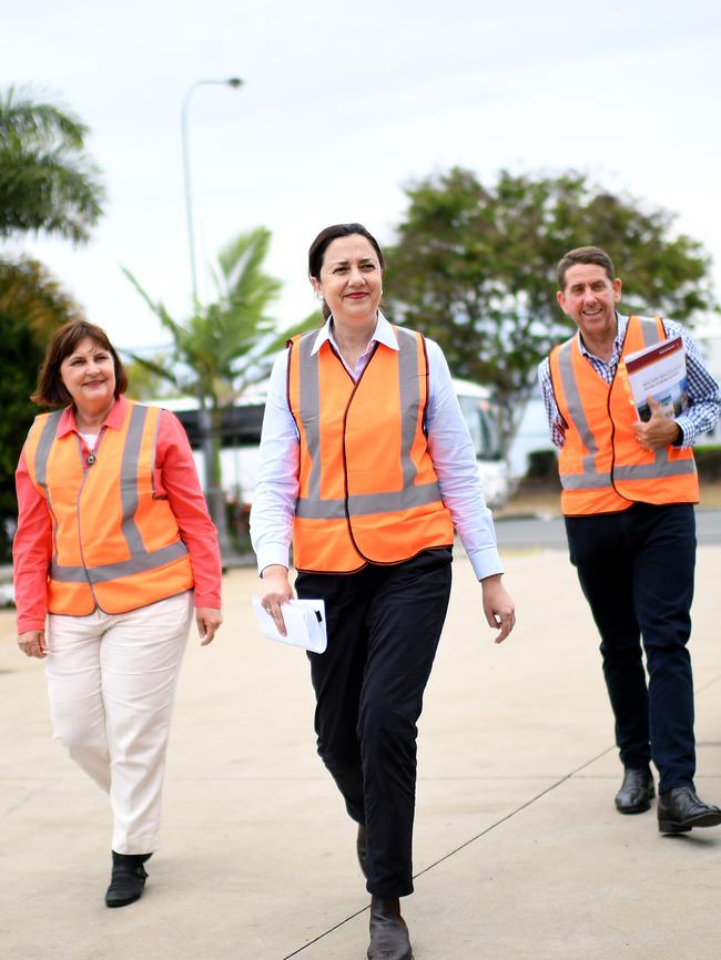 Queensland Premier Annastacia Palaszczuk (centre) arrives with Mackay MP Julieanne Gilbert and Treasurer Cameron Dick to visit De Goey Contractors (DGC). Picture: NCA NewsWire / Dan Peled