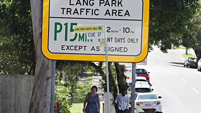 Bill Concannon from Mary Ryan’s bookstore has been waging a 10-year battle to have parking restrictions around Suncorp Stadium eased. Picture: Annette Dew