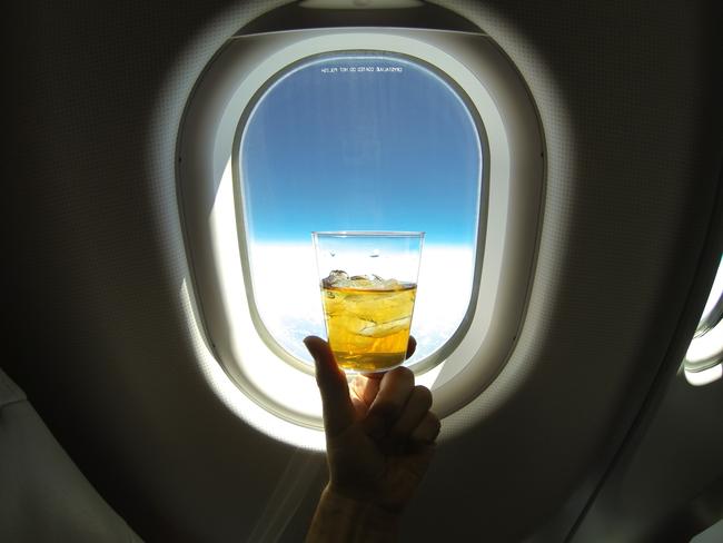 Alcohol on a flight? Absolutely.