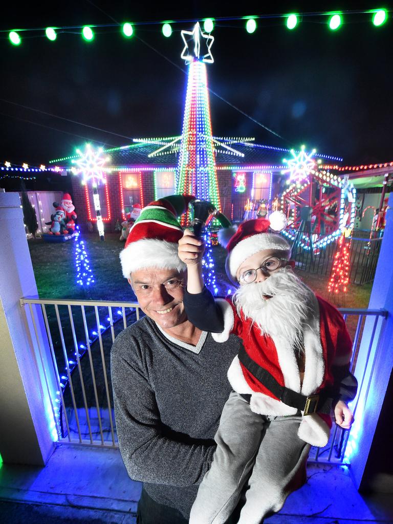 Andrew with neighbour Aron Symonds who was dressed as Santa. Picture: Tony Gough