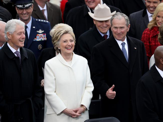 Former President Bill Clinton, former Democratic presidential nominee Hillary Clinton and former President George W. Bush stand on the West Front of the U.S. Capitol on January 20, 2017 in Washington, DC. Picture: AFP