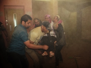 A wounded Ministry of Health staff during a car bomb attack, Iraq