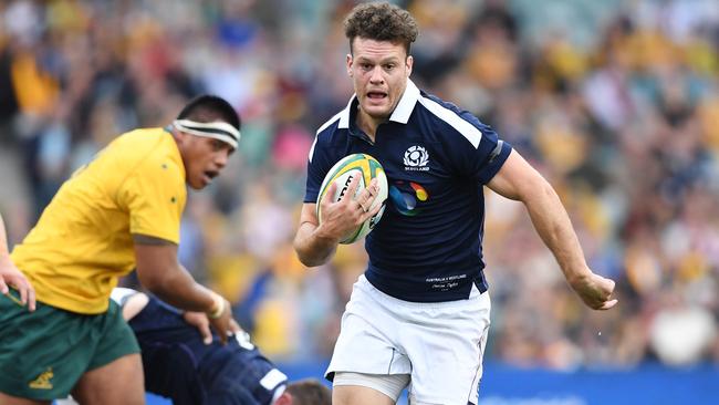 Duncan Taylor of Scotland runs away to score the opening try during their June International rugby union test match at the Allianz Stadium in Sydney, Saturday, June 17, 2017. (AAP Image/Dean Lewins) NO ARCHIVING, EDITORIAL USE ONLY