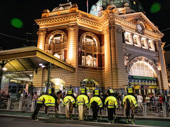 Mounted police officers patrol Flinders Street Station. Picture: Getty