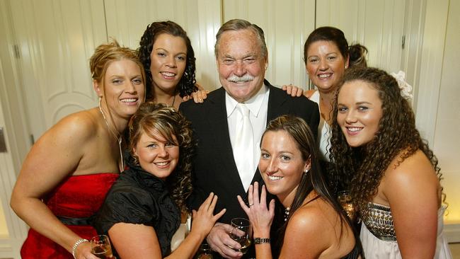 The late Ron Barassi was a VCFL ambassador who travelled all over the state to promote the grassroots game. He is pictured with Olivia Lockhart, Renee Viney, Kerrieann Lockhart, Kimberley Roberts, Sarah Fisher and Lauren Anderson from the Lexton Football-Netball Club at the now defunct Premiers Dinner in 2010.