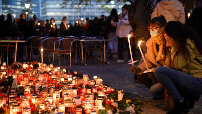 People light candles at a makeshift memorial at the scene of a terror attack last Monday in which a gunman shot a number of people, on November 5. Picture: Getty