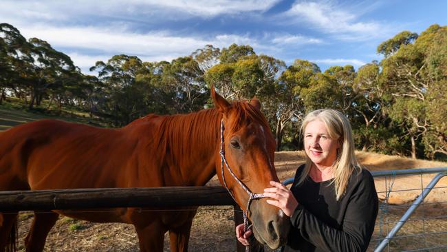 Emergency Nurse and Horse lover Jodie Hall with Zac on her Meadows property. Pic: Russell Millard