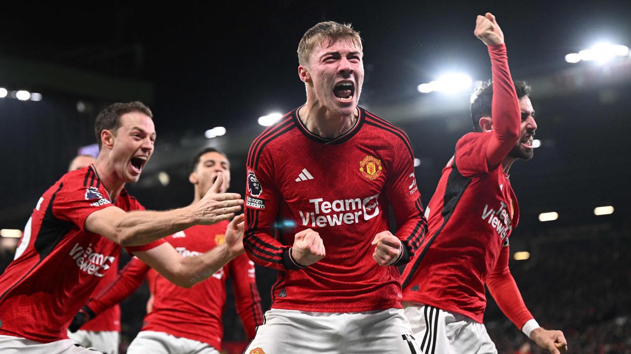 Rasmus Hojlund celebrates with teammates after scoring their third goal. Picture: AFP