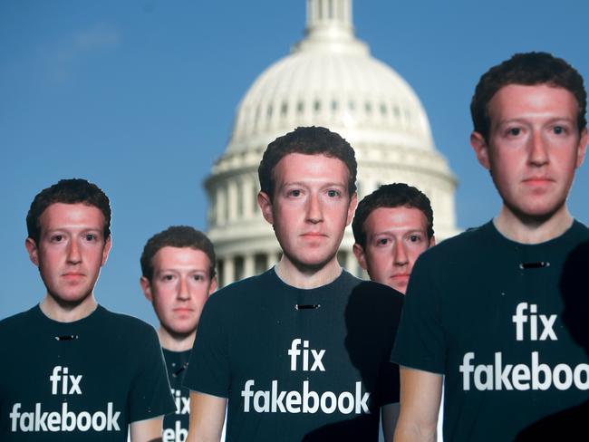 One hundred cardboard cutouts of Facebook founder and CEO Mark Zuckerberg stand outside the US Capitol in Washington, DC. Picture: AFP