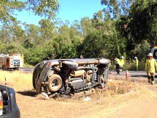 A vehicle rolled into a ditch after it and another car collided on the Bruce Hwy at Chatworth this morning. Picture: Jacob Carson