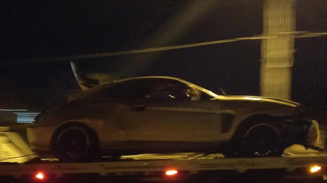 The Hyundai Tiburon was hauled away from the scene.