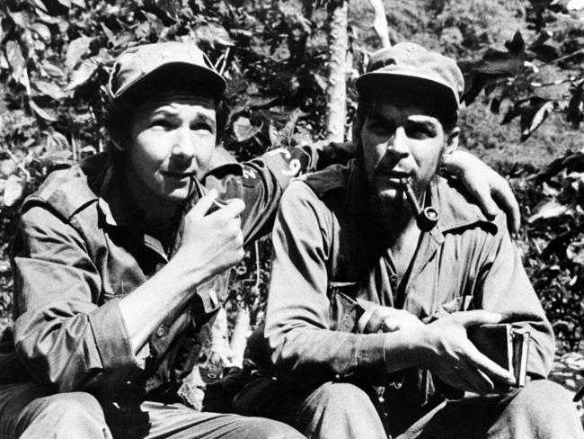 Cuban politician Raul Castro (left) brother of President Fidel Castro with Che Guevara in their Sierra de Cristal Mountain stronghold south of Havana, Cuba, during the Cuban revolution in June 1958. Picture: AP