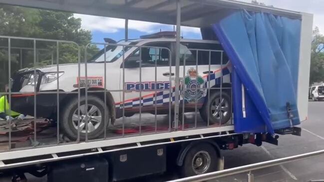 New images reveal extensive damage to a police car during immense gunfire at a Darling Downs property.