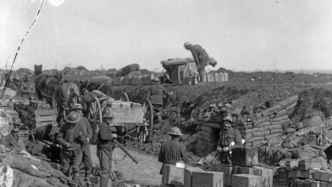 Members of the 2nd Division at a dump of frontline supplies near Iggery Corner, during the fight for Bullecourt. Picture: Australian War Memorial (E00436)