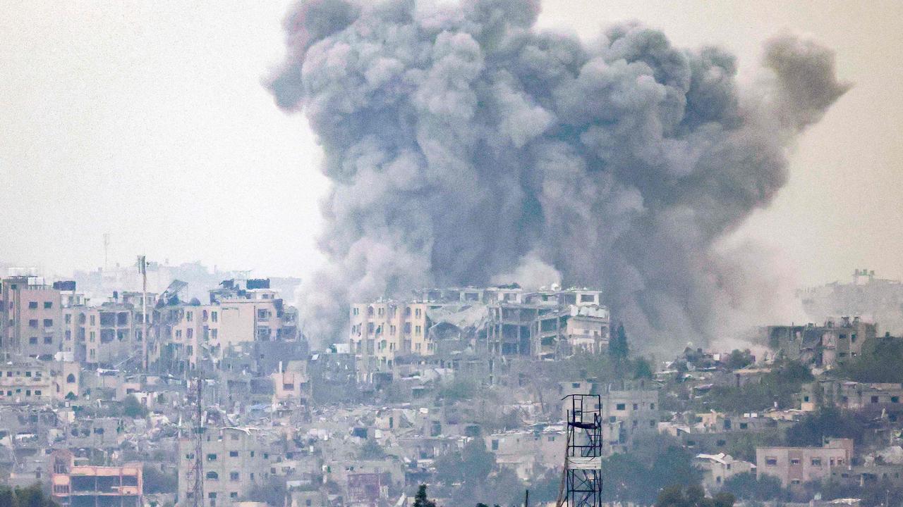 A smoke plume ascending following Israeli bombardment over the northern Gaza Strip amid the ongoing battles between Israel and the Palestinian group Hamas. (Photo by Menahem KAHANA / AFP)