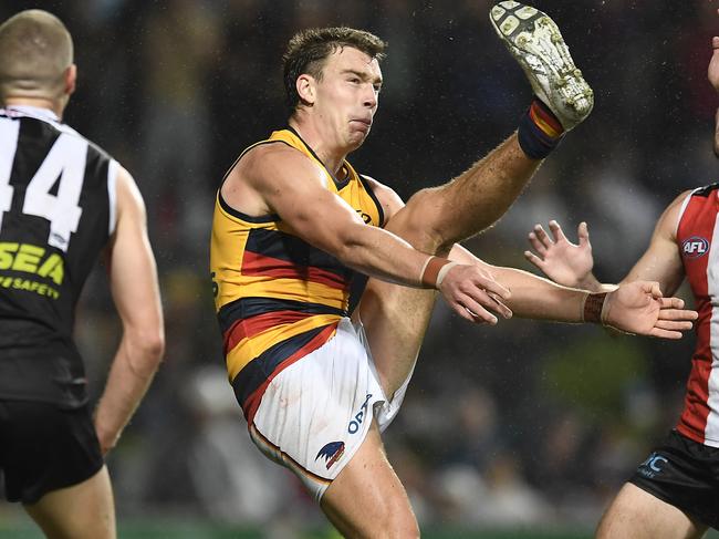 CAIRNS, AUSTRALIA - JUNE 12: Riley Thilthorpe of the Crows kicks the match winning goal during the round 13 AFL match between the St Kilda Saints and the Adelaide Crows at Cazaly's Stadium on June 12, 2021 in Cairns, Australia. (Photo by Albert Perez/AFL Photos/via Getty Images)