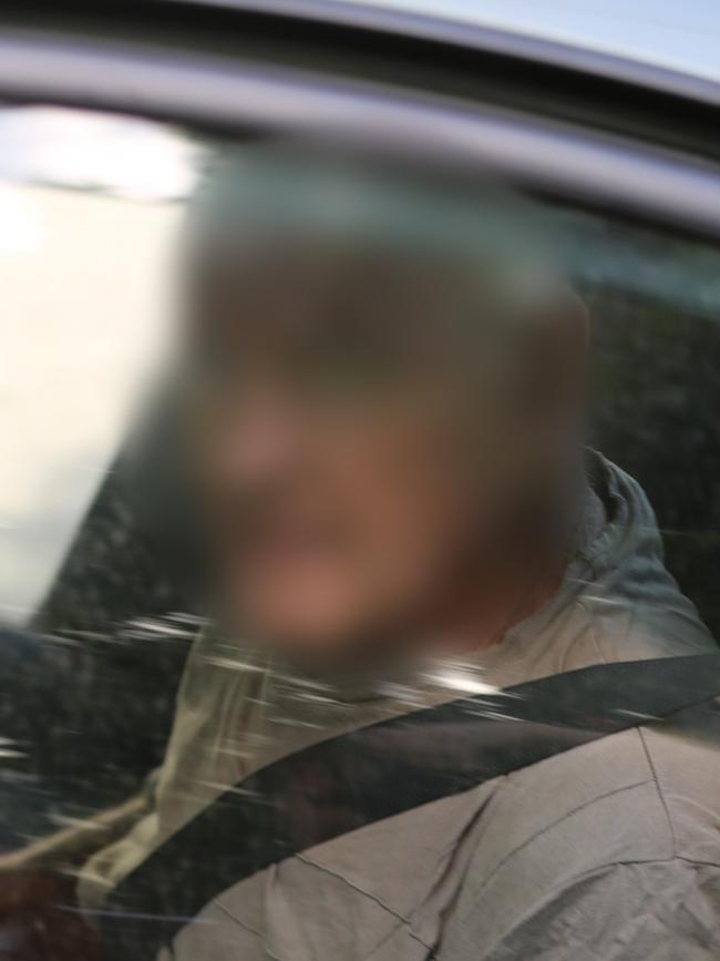 Chris Dawson in the back of a police car. Picture: NSW police