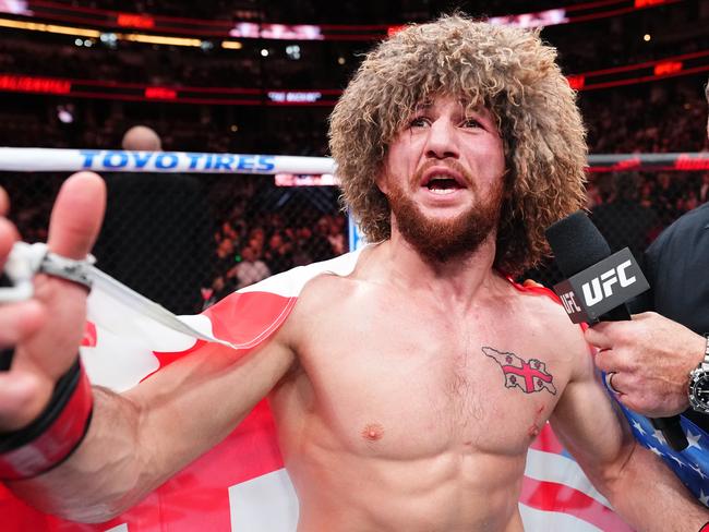 ANAHEIM, CALIFORNIA - FEBRUARY 17: Merab Dvalishvili of Georgia reacts after his victory against Henry Cejudo in a bantamweight fight during the UFC 298 event at Honda Center on February 17, 2024 in Anaheim, California. (Photo by Chris Unger/Zuffa LLC via Getty Images)