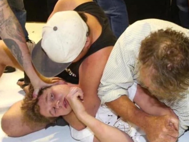 Senator Fraser Anning supporters put the 17-year-old boy in a headlock.