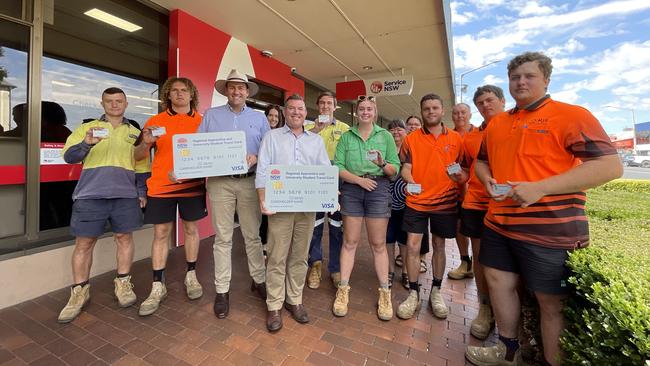 Former Regional Roads Minister Sam Farraway (third-left) and now NSW National leader Dugald Saunders (centre) with mock-ups of the card in Dubbo in February. Picture: Supplied