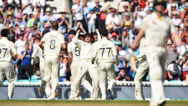 England's captain Joe Root celebrates the rarity of an early dismissal of Steve Smith.