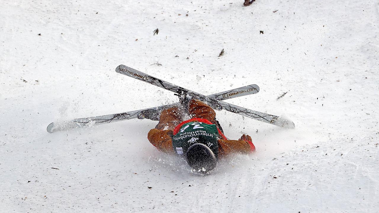 George McQuinn of Team USA crashes during his run in the Men's Mogul Finals during the Intermountain Healthcare Freestyle International Ski World Cup. Photo: Ezra Shaw/Getty Images/AFP