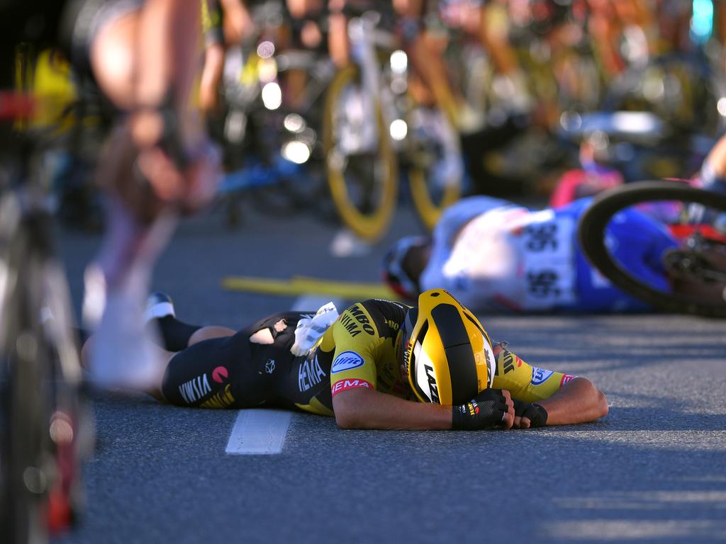 Dylan Groenewegen on the ground after the crash.