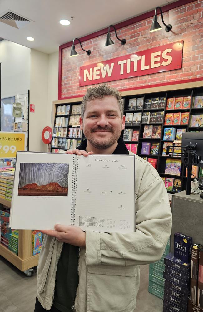 Brody Gamble with his image ‘Rainbow Valley - Valley of the Stars’.