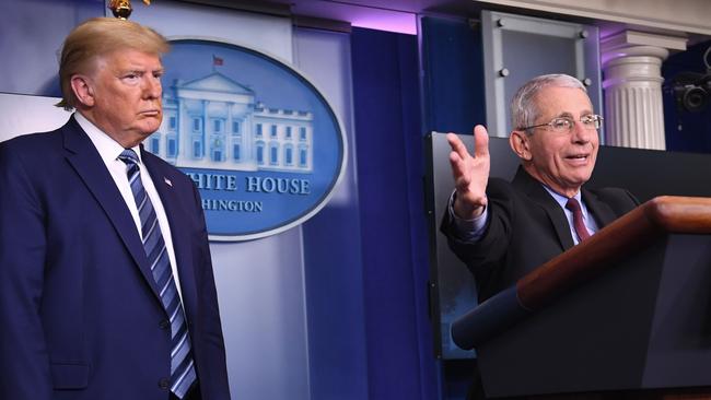 US President Donald Trump, left, and Director of the National Institute of Allergy and Infectious Diseases Anthony Fauci at an unscheduled briefing after a coronavirus Task Force meeting at the White House on April 5. Picture: Eric Baradat/AFP