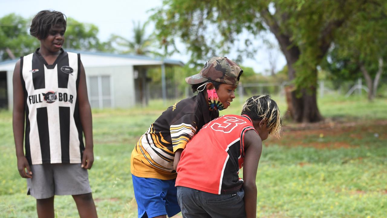 Rockhole residents take their first steps outside after a week long hard lockdown. Picture: Amanda Parkinson