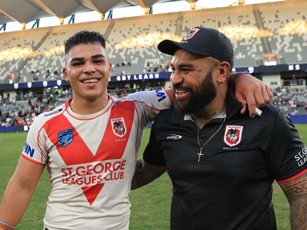 Jacob Halangahu with father, Toa, after winning the SG Ball Cup with the Dragons. Picture: Dragons