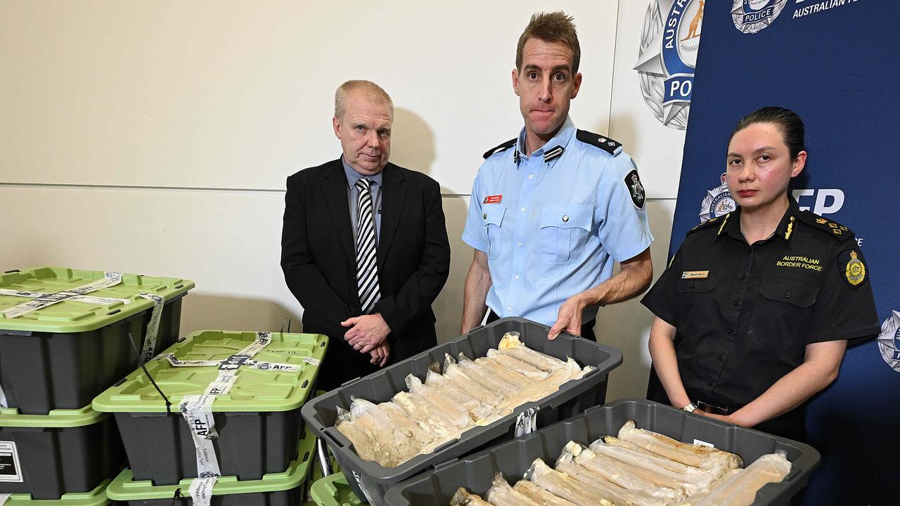 Acting Superintendent Tim Leadbetter, AFP Superintendent Adrian Telfer and Melati Smith from Australian Border Force. Picture: Lyndon Mechielsen/Courier Mail