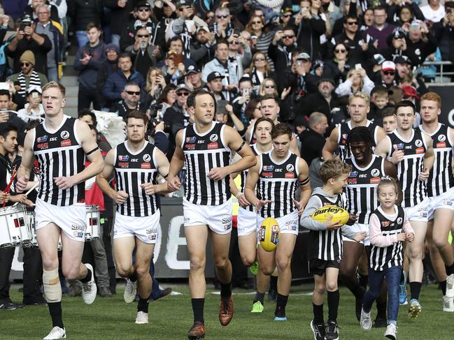 SANFL - GRAND FINAL  22/09/19 - Port Adelaide v Glenelg at Adelaide Oval. Port Adelaide Magpies run out onto the oval. Picture SARAH REED