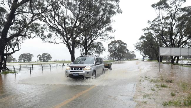 Conditions easing: Flooding on the Calder Highway, south of Charlton. Picture: News Corp