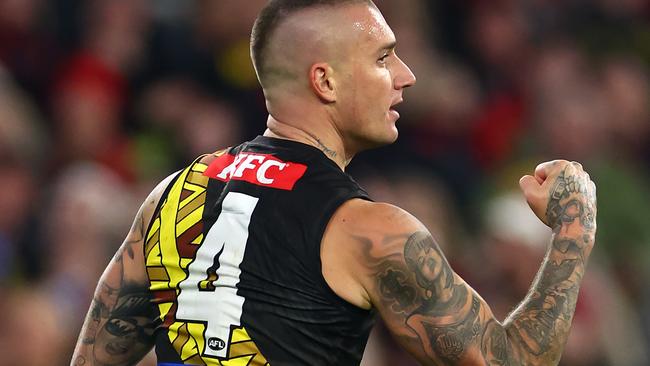 Dustin Martin will at least see out the season with the Tigers, his coach says. Picture: Quinn Rooney/Getty Images